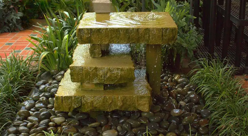 Pebble Mosaic + Raised Garden Beds + Water Feature