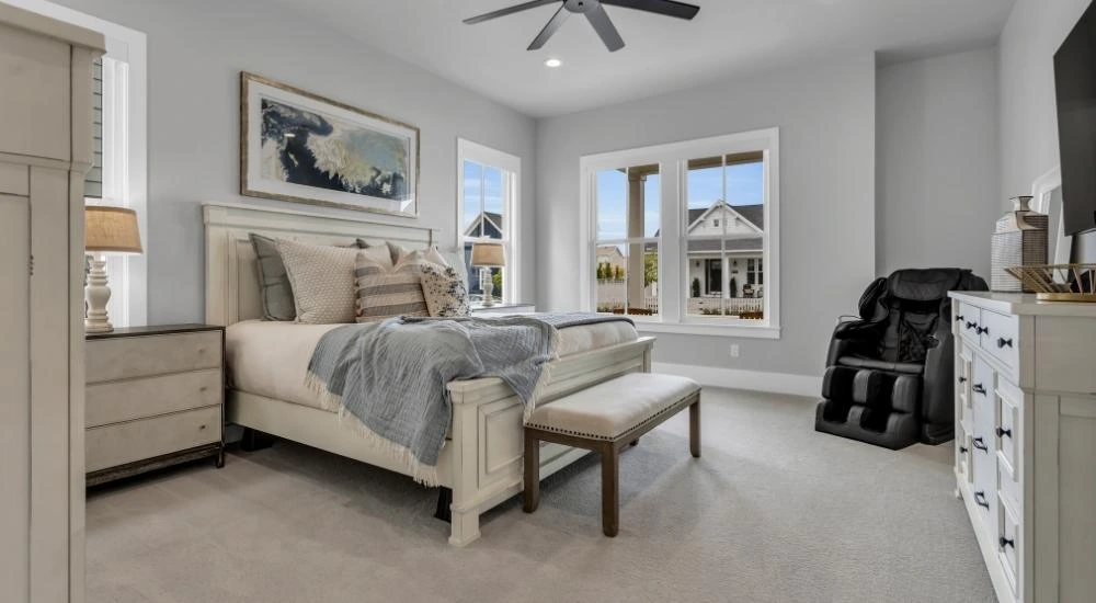 6. Minimalist Bedding + Gold Accents + Muted Pastel Art