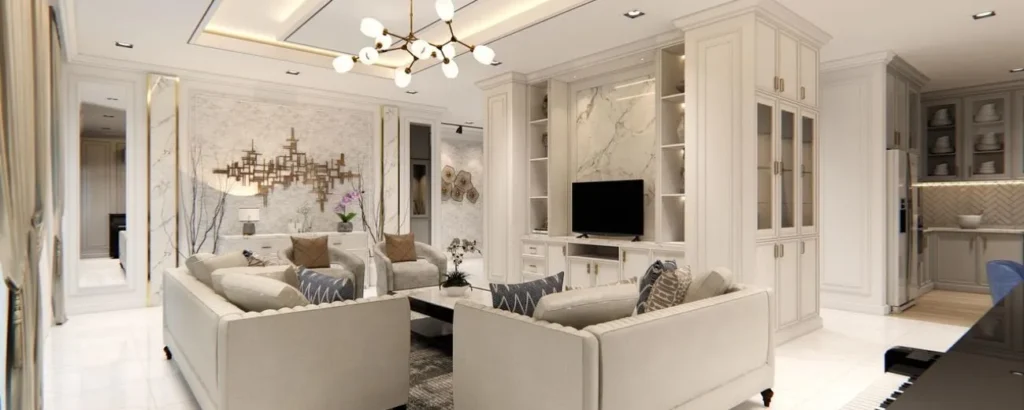 Elegant modern living room with cream-toned sofas, marble accents, and ambient lighting.