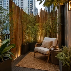 Bamboo privacy screen outdoor reading nook with lounge chair, planters, and secluded urban balcony retreat