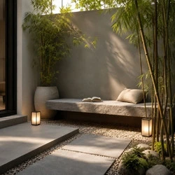 Modern zen outdoor reading nook with stone bench, bamboo plants, gravel landscape, and minimalist courtyard design